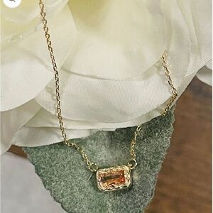 Elegant Gold Necklace with Orange Gemstone